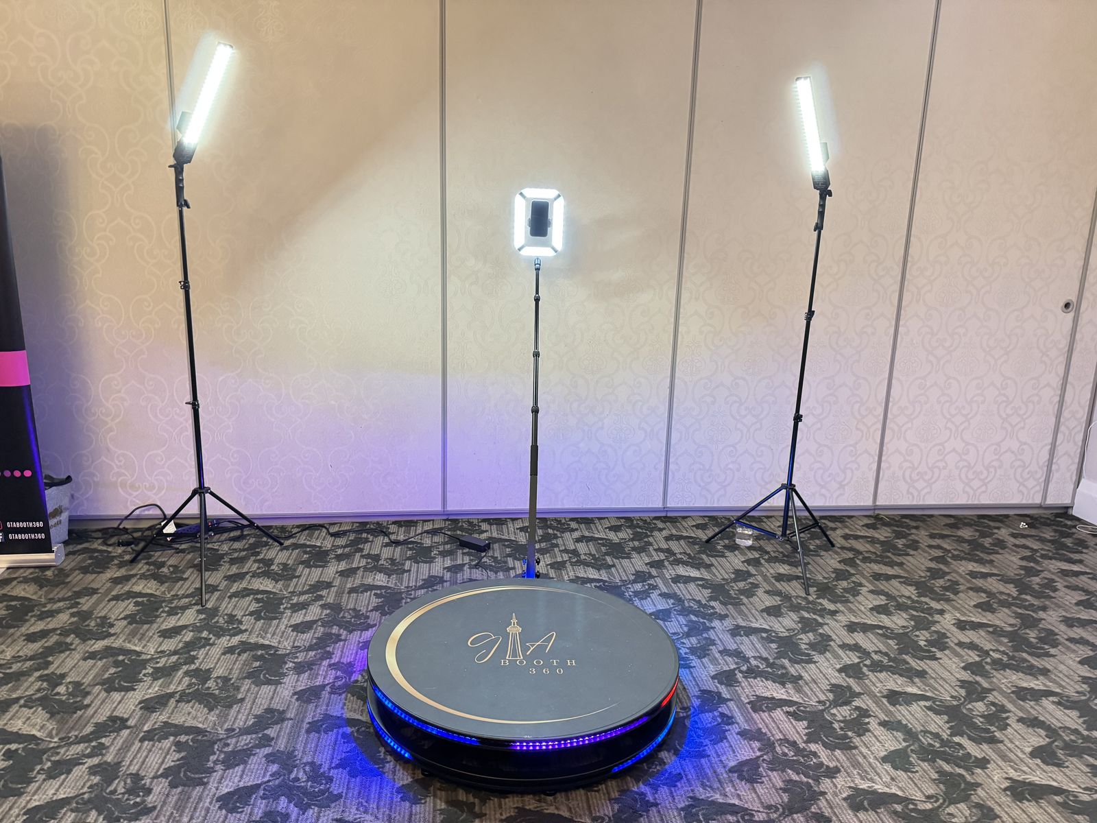 GTABOOTH360 360 video booth platform with LED lighting set up in a banquet room