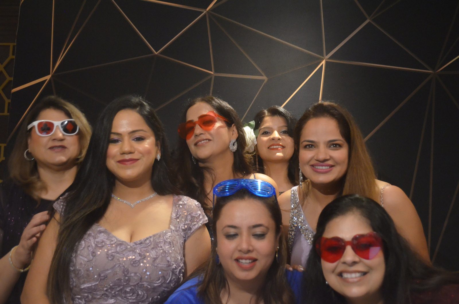 Guests celebrating in the GTABOOTH360 photo booth at a birthday party