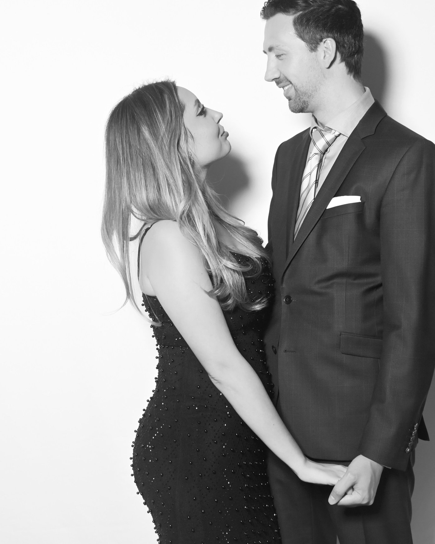 Couple posing at the Portrait Station, black and white